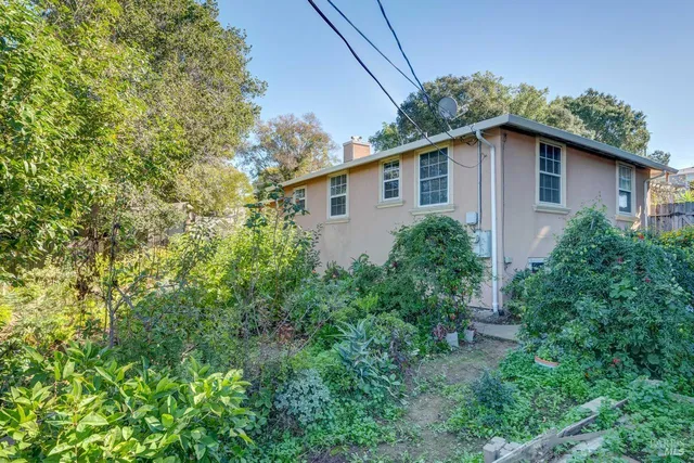 a house view with a outdoor space
