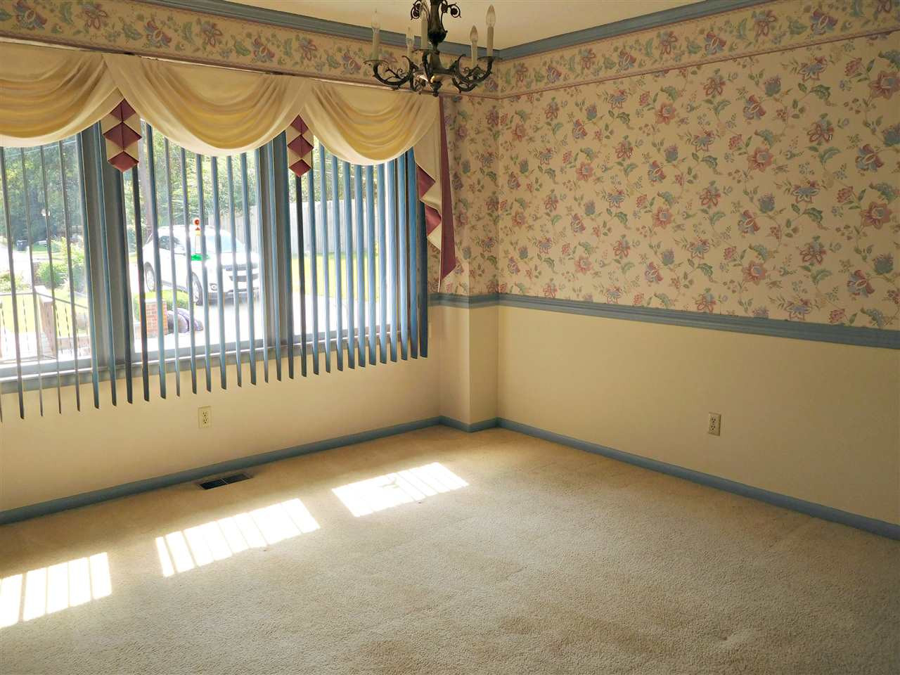 2217 Timberlake Drive Raleigh, NC 27604 - Photo 6 of 22 Separate dining room will accommodate everyone for the holidays! Light and bright with large windows. Dining Room