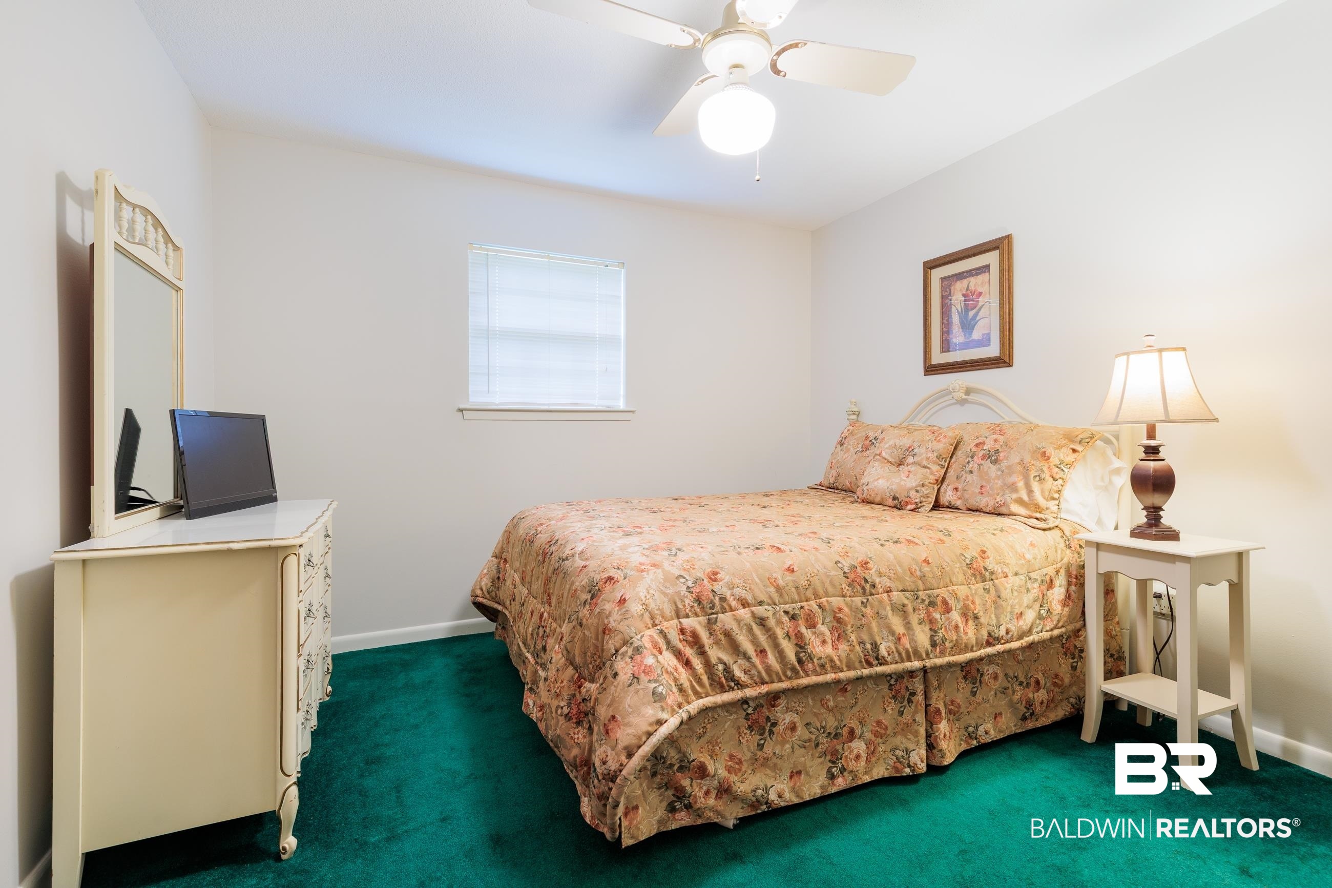 1367 Spring Valley Court Mobile, AL 36693 - Photo 14 of 29 Interior room featuring a window with blinds, a ceiling fan with integrated lighting, and green carpet flooring
