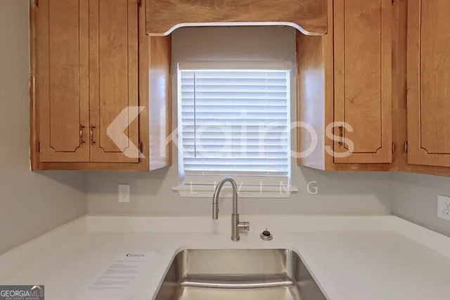 a bathroom with a sink and a bathtub