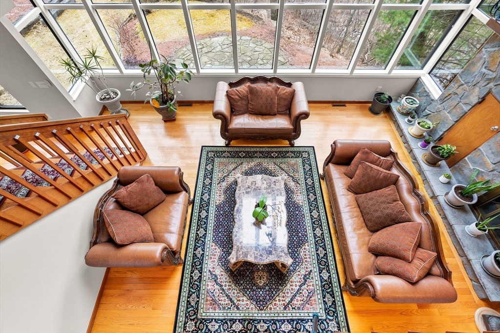4 Rockland Terrace Saugus, MA 01906 - Photo 11 of 42 a living room with furniture and a floor to ceiling window