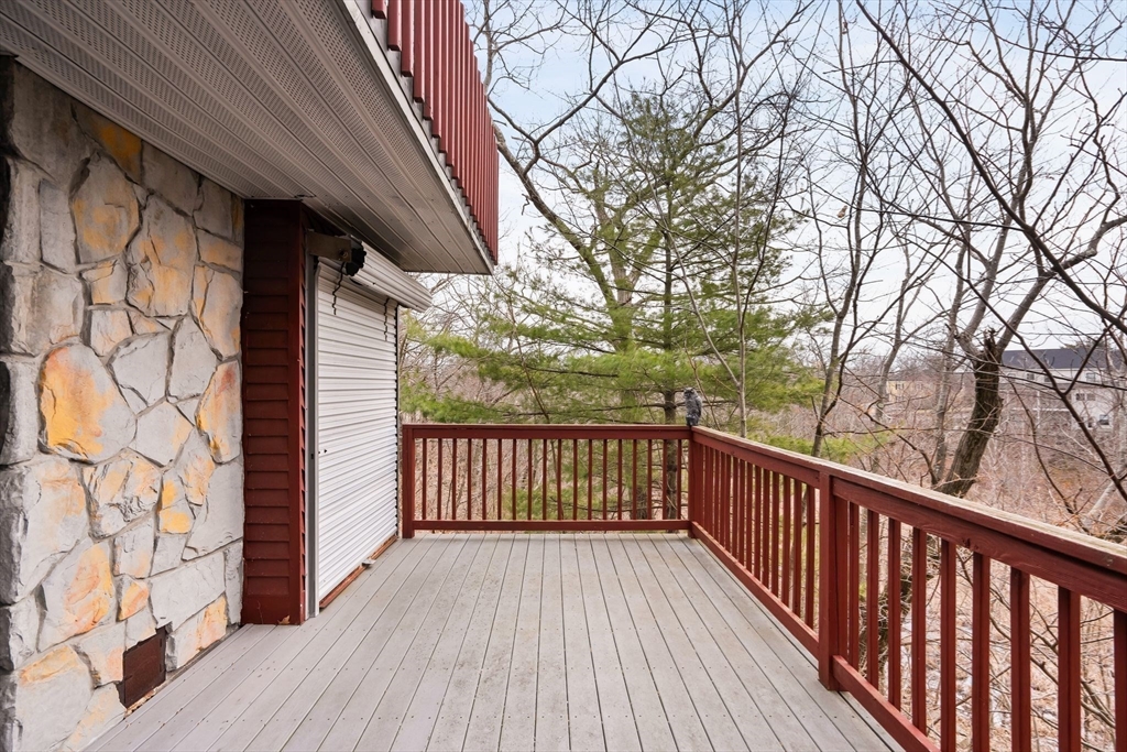 4 Rockland Terrace Saugus, MA 01906 - Photo 18 of 42 a view of balcony with wooden floor and fence