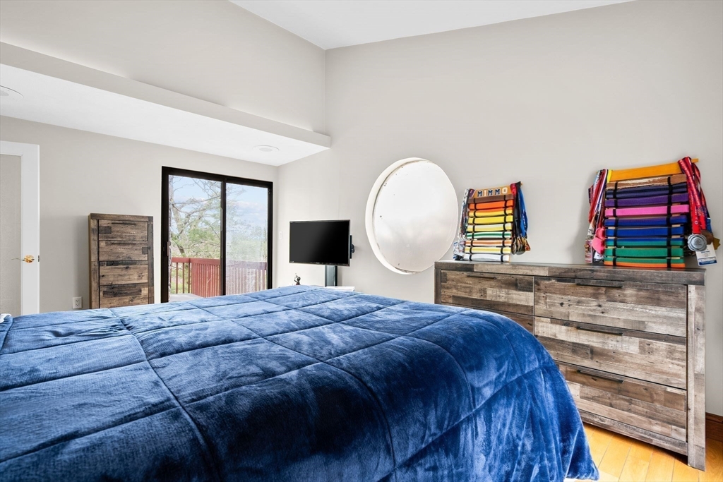 4 Rockland Terrace Saugus, MA 01906 - Photo 25 of 42 a bedroom with double bed and a dresser