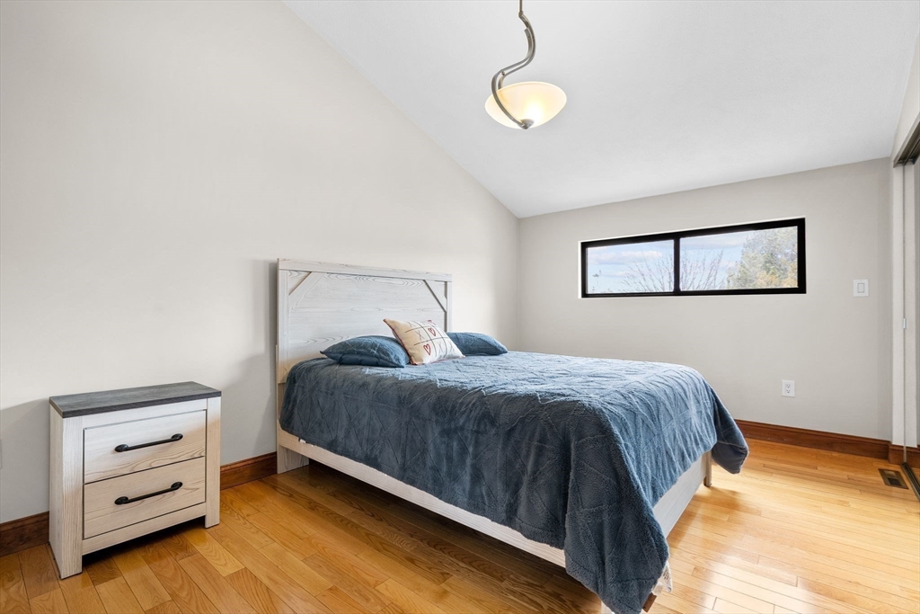 4 Rockland Terrace Saugus, MA 01906 - Photo 28 of 42 a bedroom with a bed and a dresser