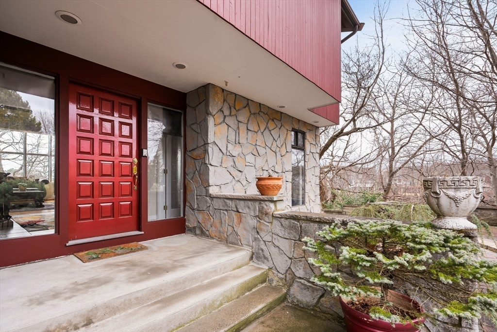 4 Rockland Terrace Saugus, MA 01906 - Photo 34 of 42 a front view of a house with a yard