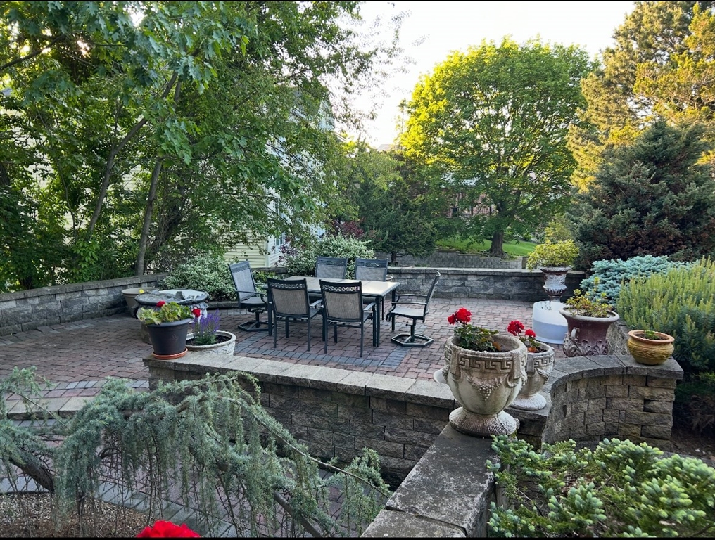 4 Rockland Terrace Saugus, MA 01906 - Photo 41 of 42 a view of a backyard with sitting area and slide