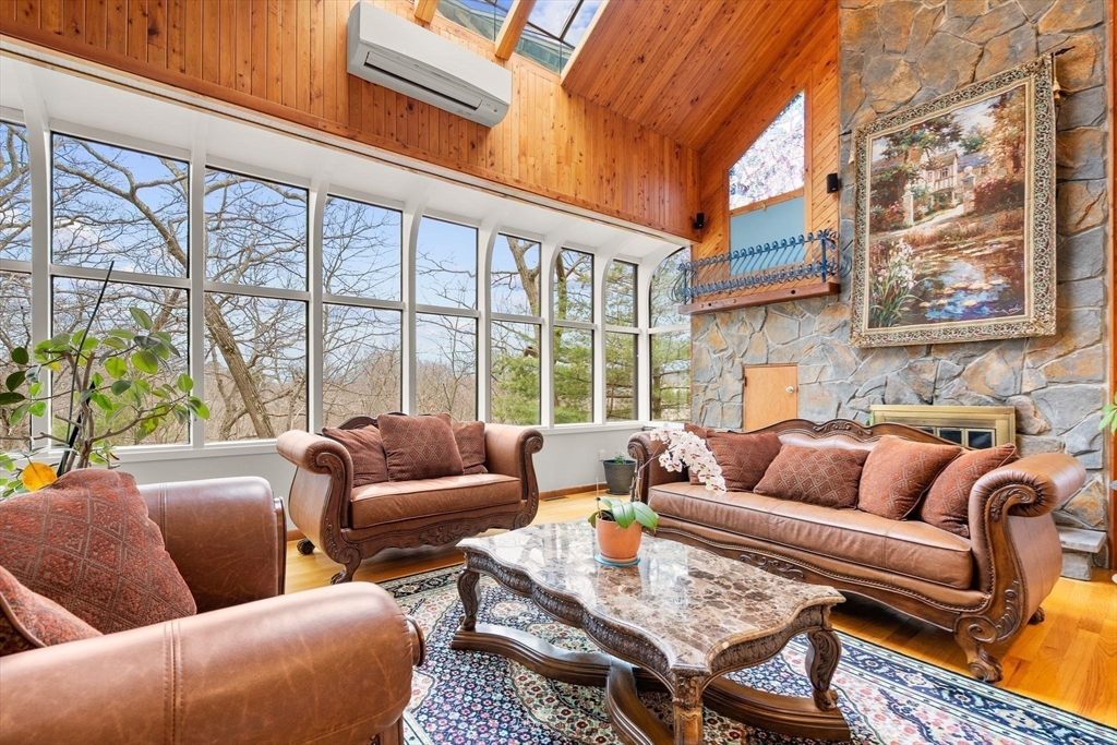 4 Rockland Terrace Saugus, MA 01906 - Photo 10 of 42 a living room with furniture water view and large windows