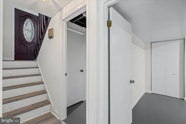 a view of entryway with wooden floor