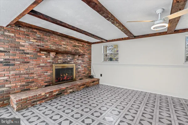 a living room with a fireplace