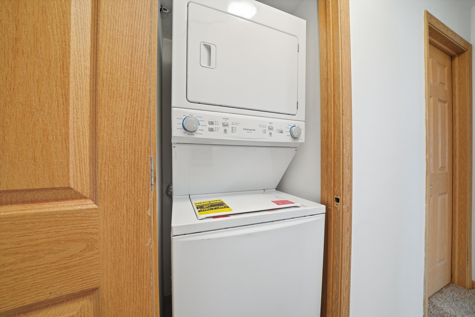 575 North Strack Street, Unit 302 Cortland, IL 60112 - Photo 9 of 11 a utility room with dryer and washer