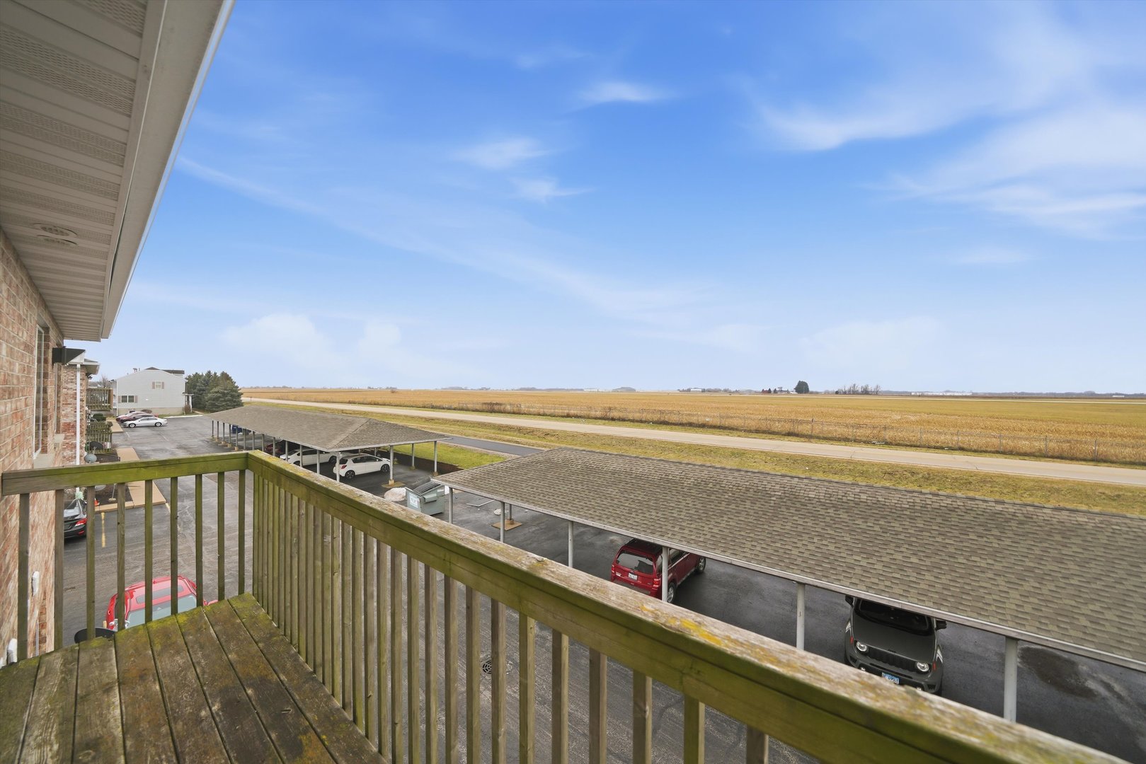 575 North Strack Street, Unit 302 Cortland, IL 60112 - Photo 10 of 11 a view of a balcony with an ocean view