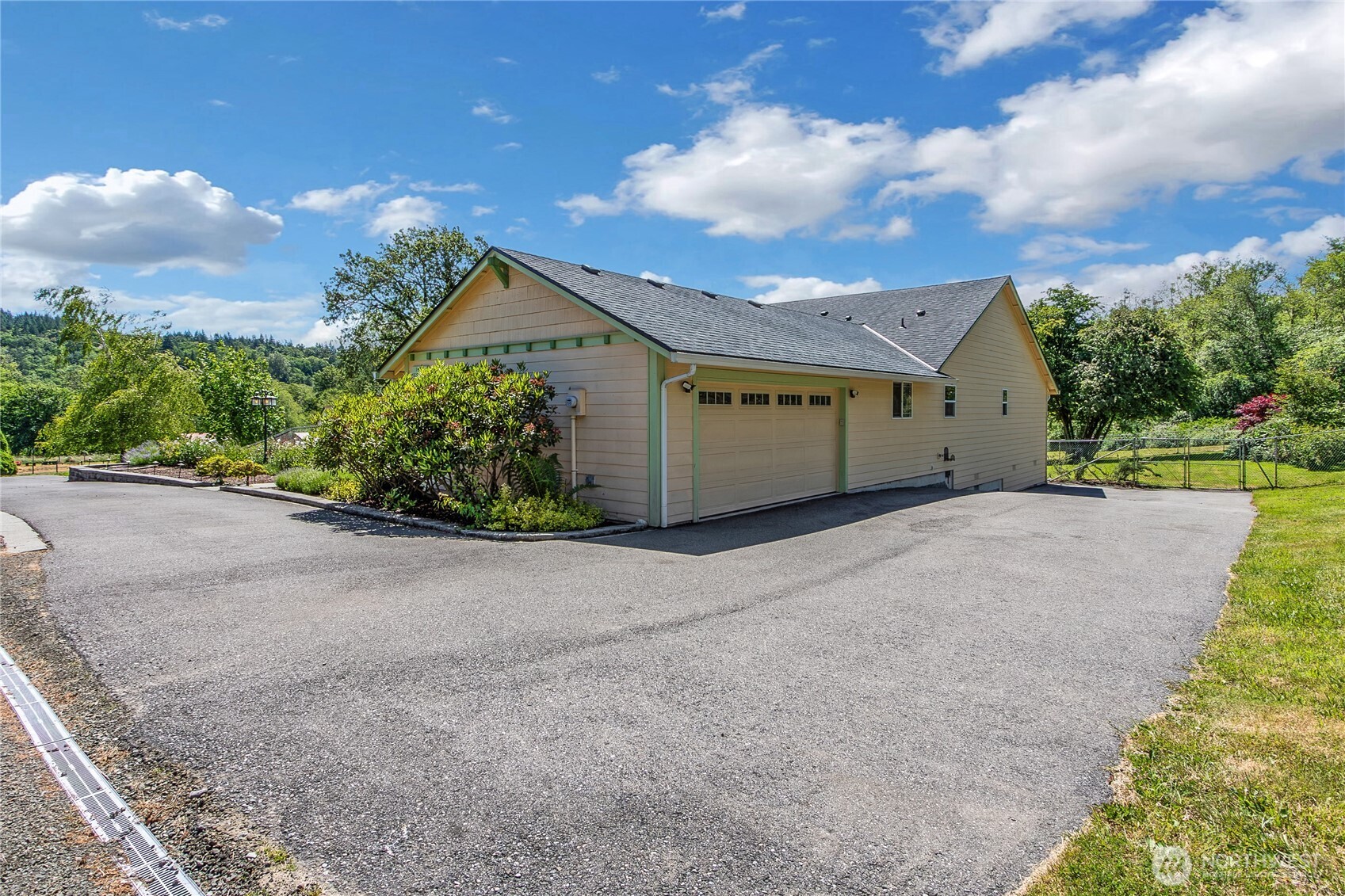 1450 Southeast Spruce Road Port Orchard, WA 98367 - Photo 2 of 39 a view of a house with a street
