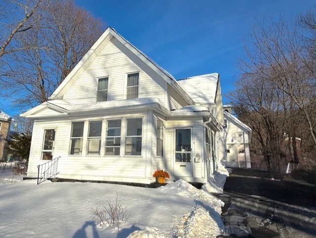 15 Main Street Allenstown, NH 03275 - Photo 1 of 39 a view of a white building with a large windows