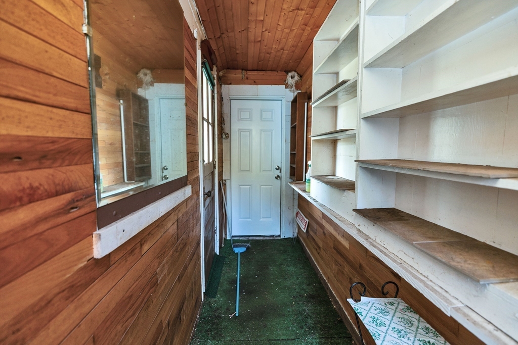 15 Main Street Allenstown, NH 03275 - Photo 13 of 39 a bathroom with a sink and a large mirror
