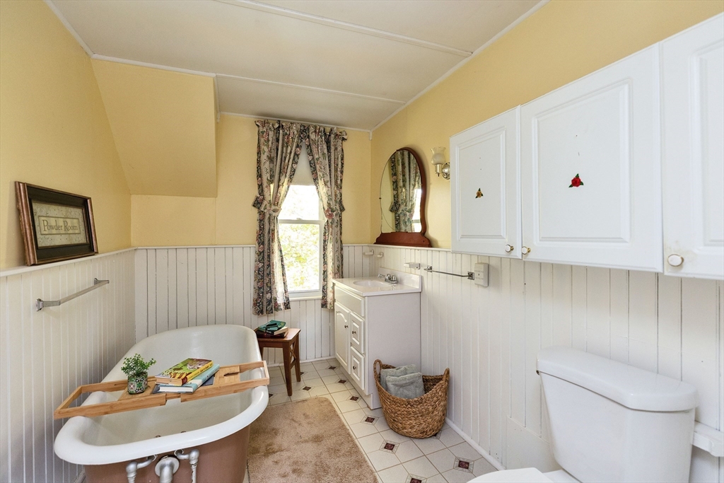 15 Main Street Allenstown, NH 03275 - Photo 24 of 39 a living room with furniture and a table