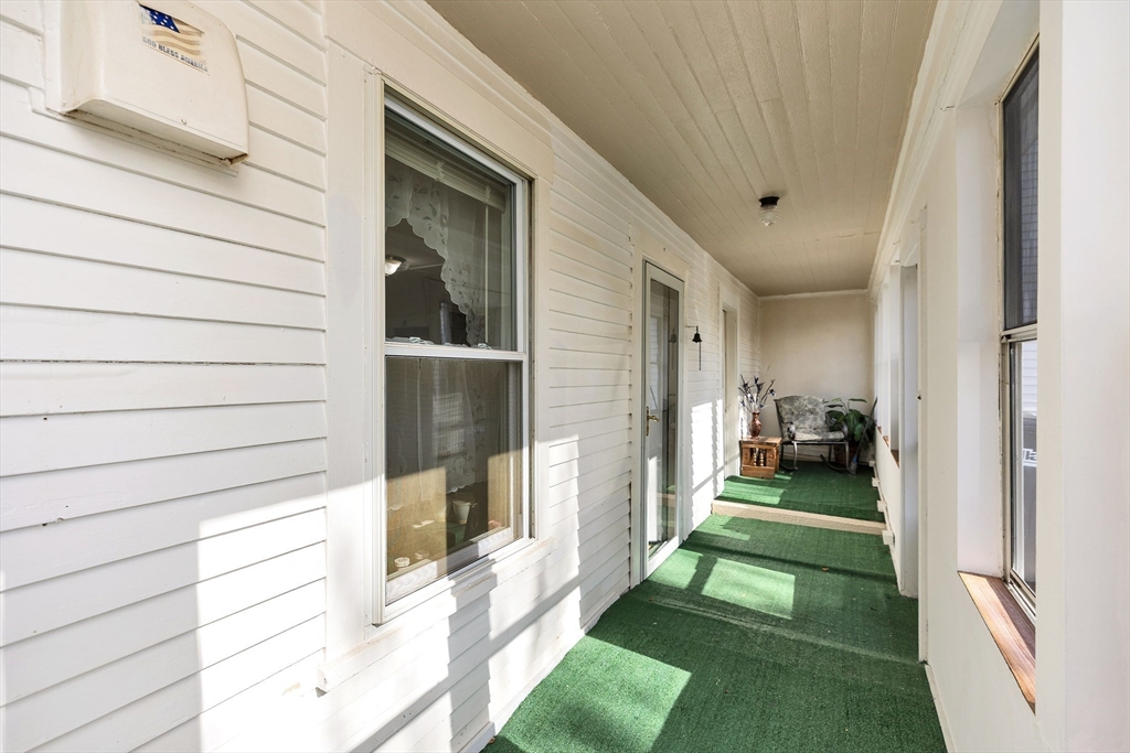 15 Main Street Allenstown, NH 03275 - Photo 30 of 39 a view of a porch with seating space
