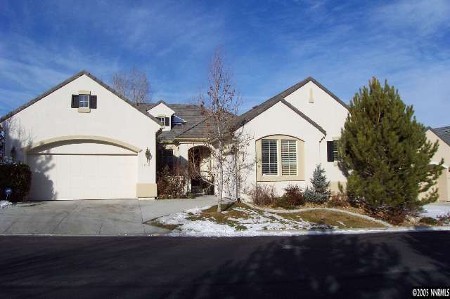 1815 Caughlin Creek Road Reno, NV 89519 - Photo 1 of 9 a front view of a house with a yard