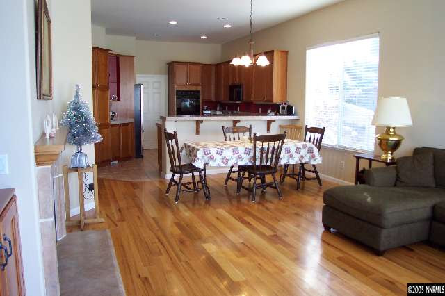 1815 Caughlin Creek Road Reno, NV 89519 - Photo 4 of 9 a living room with furniture and kitchen view