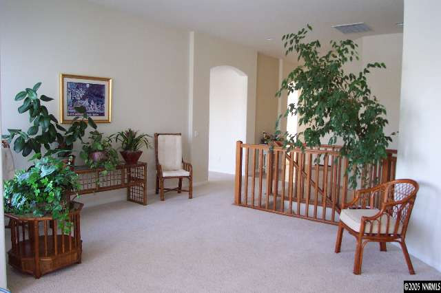 1815 Caughlin Creek Road Reno, NV 89519 - Photo 6 of 9 a living room with furniture and a potted plant