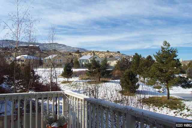 1815 Caughlin Creek Road Reno, NV 89519 - Photo 8 of 9 a view of a lake from a balcony