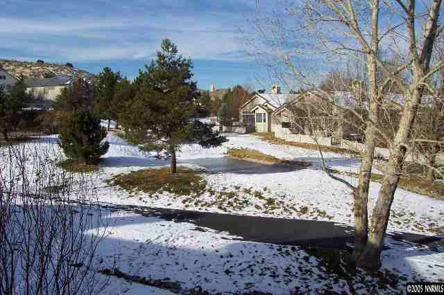 1815 Caughlin Creek Road Reno, NV 89519 - Photo 9 of 9 a view of a yard with wooden fence