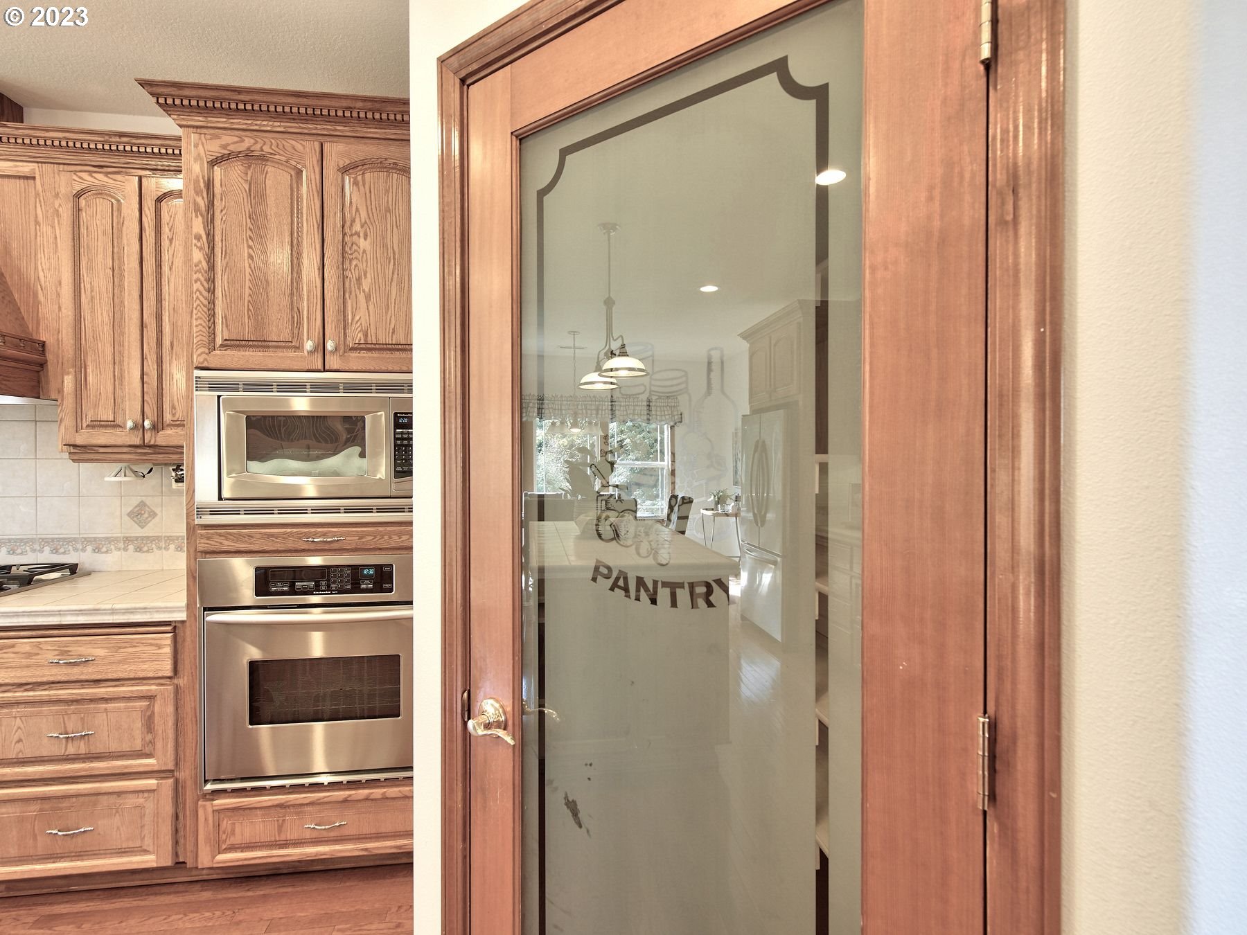 1101 Northeast 264th Street Ridgefield, WA 98642 - Photo 11 of 48 a view of a kitchen from the hallway