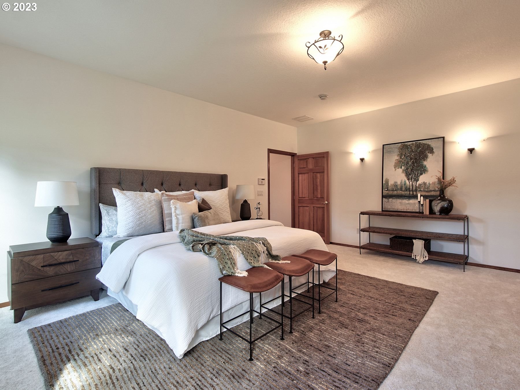 1101 Northeast 264th Street Ridgefield, WA 98642 - Photo 23 of 48 a bedroom with bed and a couch