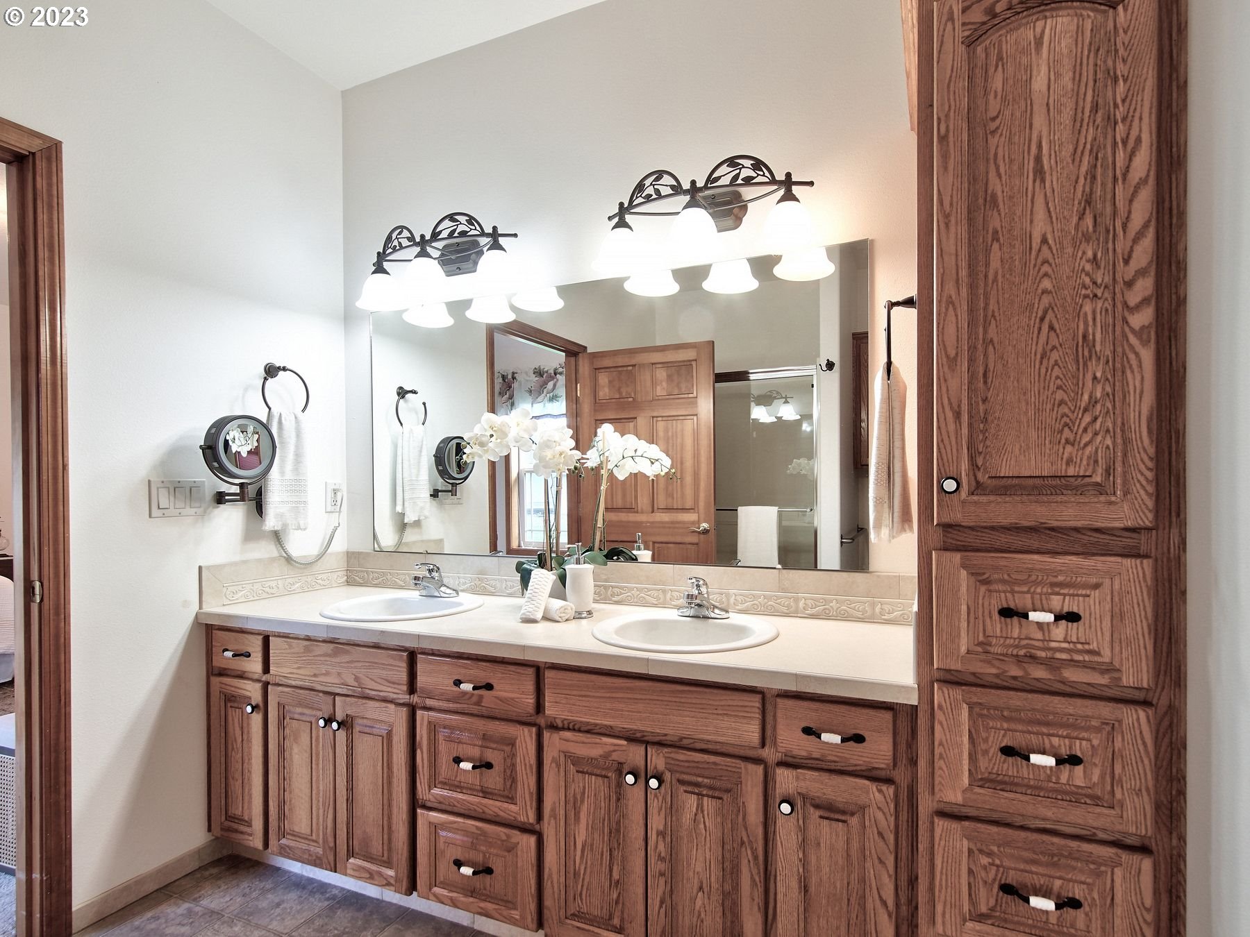 1101 Northeast 264th Street Ridgefield, WA 98642 - Photo 24 of 48 a bathroom with a double vanity sink mirror and