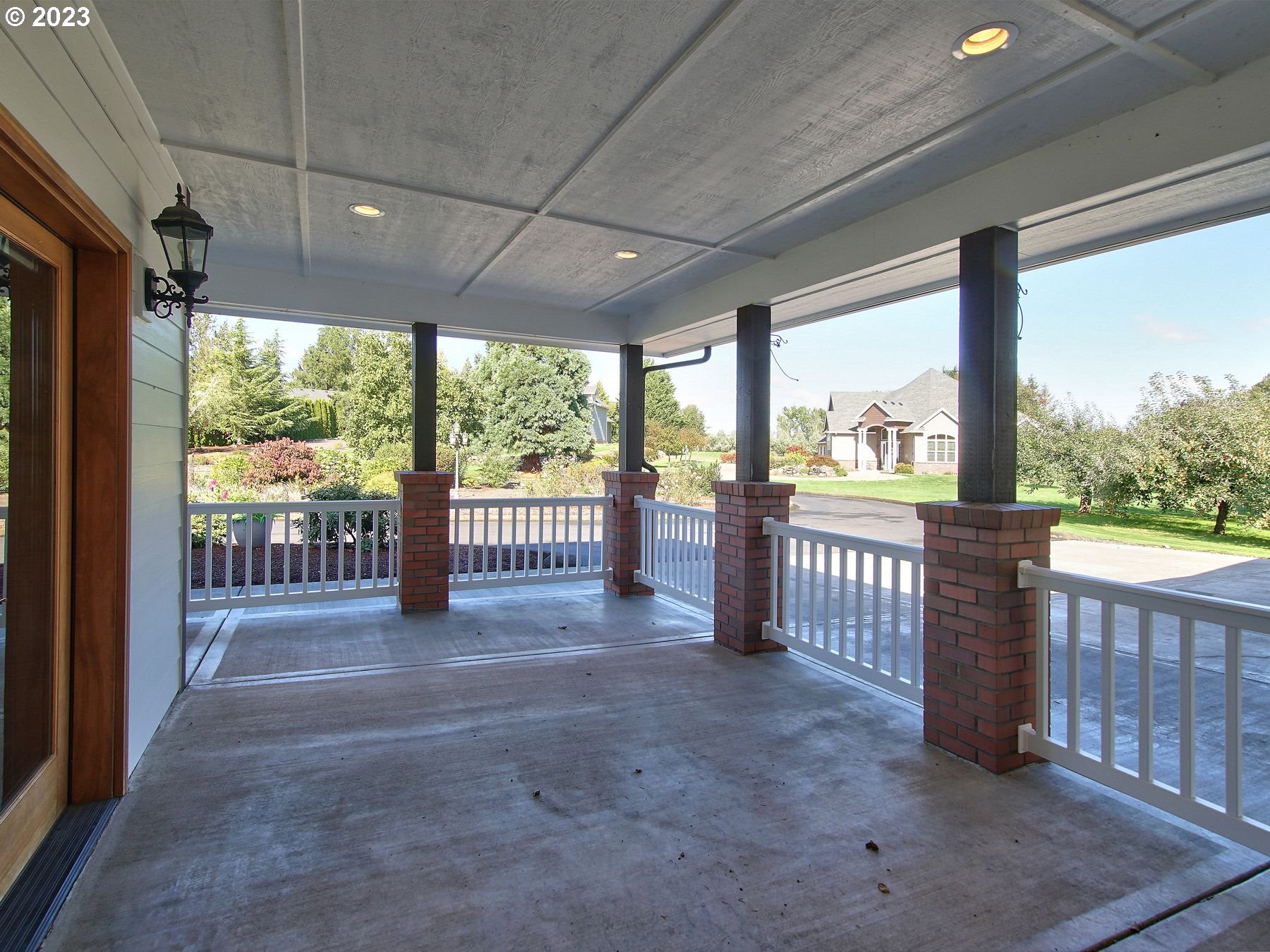 1101 Northeast 264th Street Ridgefield, WA 98642 - Photo 28 of 48 a view of a porch with wooden fence
