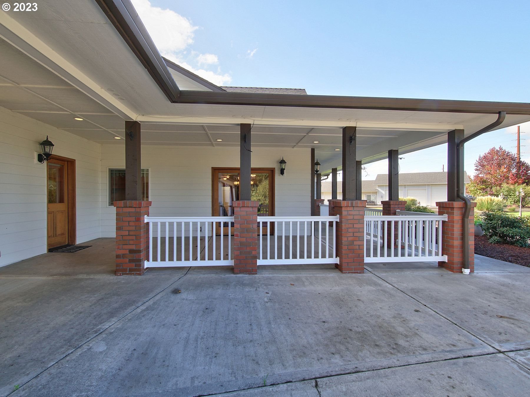 1101 Northeast 264th Street Ridgefield, WA 98642 - Photo 29 of 48 a view of a porch with wooden floor and fence