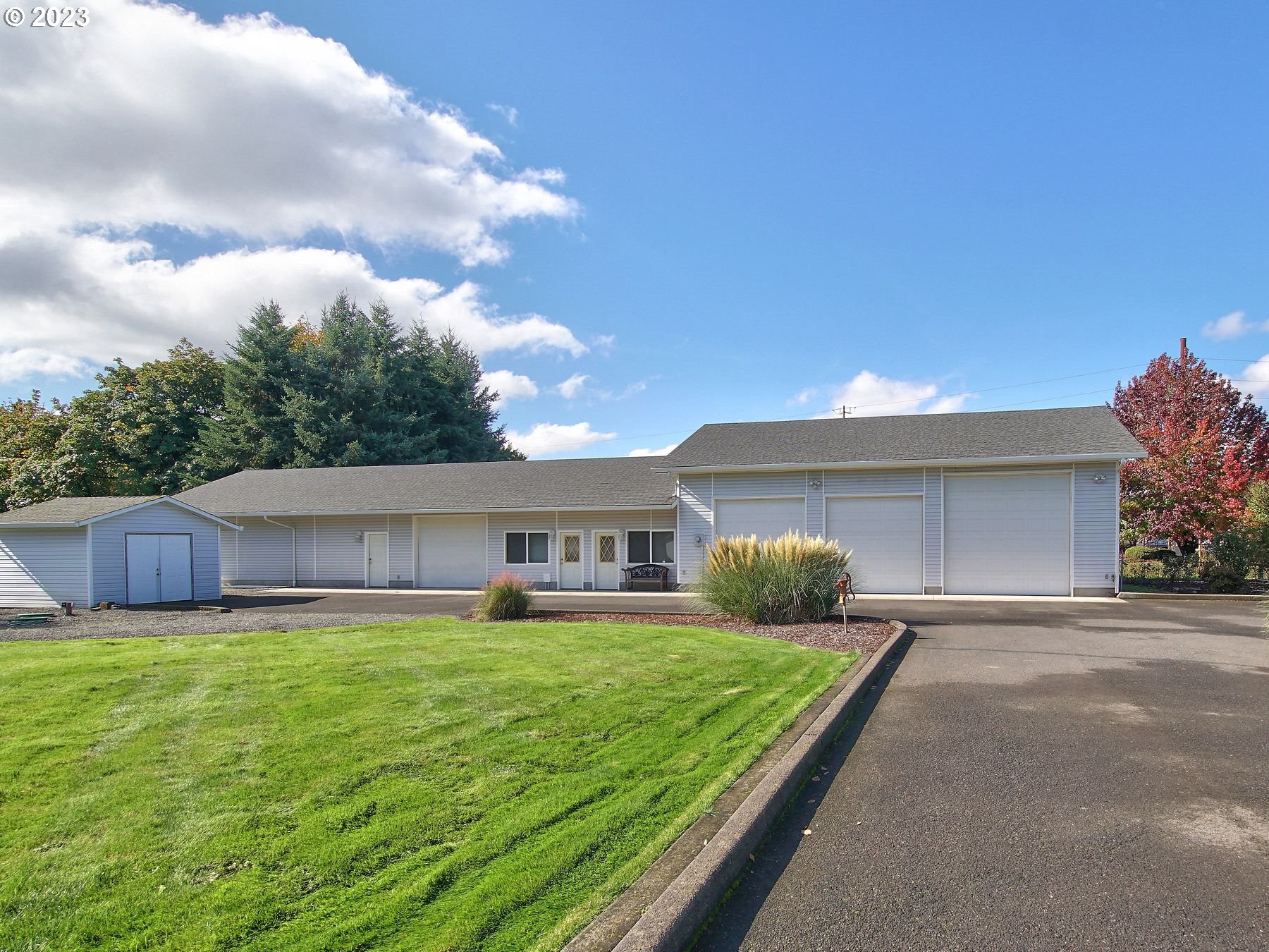 1101 Northeast 264th Street Ridgefield, WA 98642 - Photo 30 of 48 a house view with a sitting space and garden