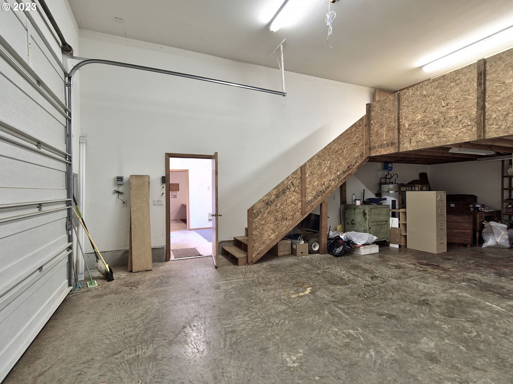 1101 Northeast 264th Street Ridgefield, WA 98642 - Photo 33 of 48 a view of an empty room with wooden floor