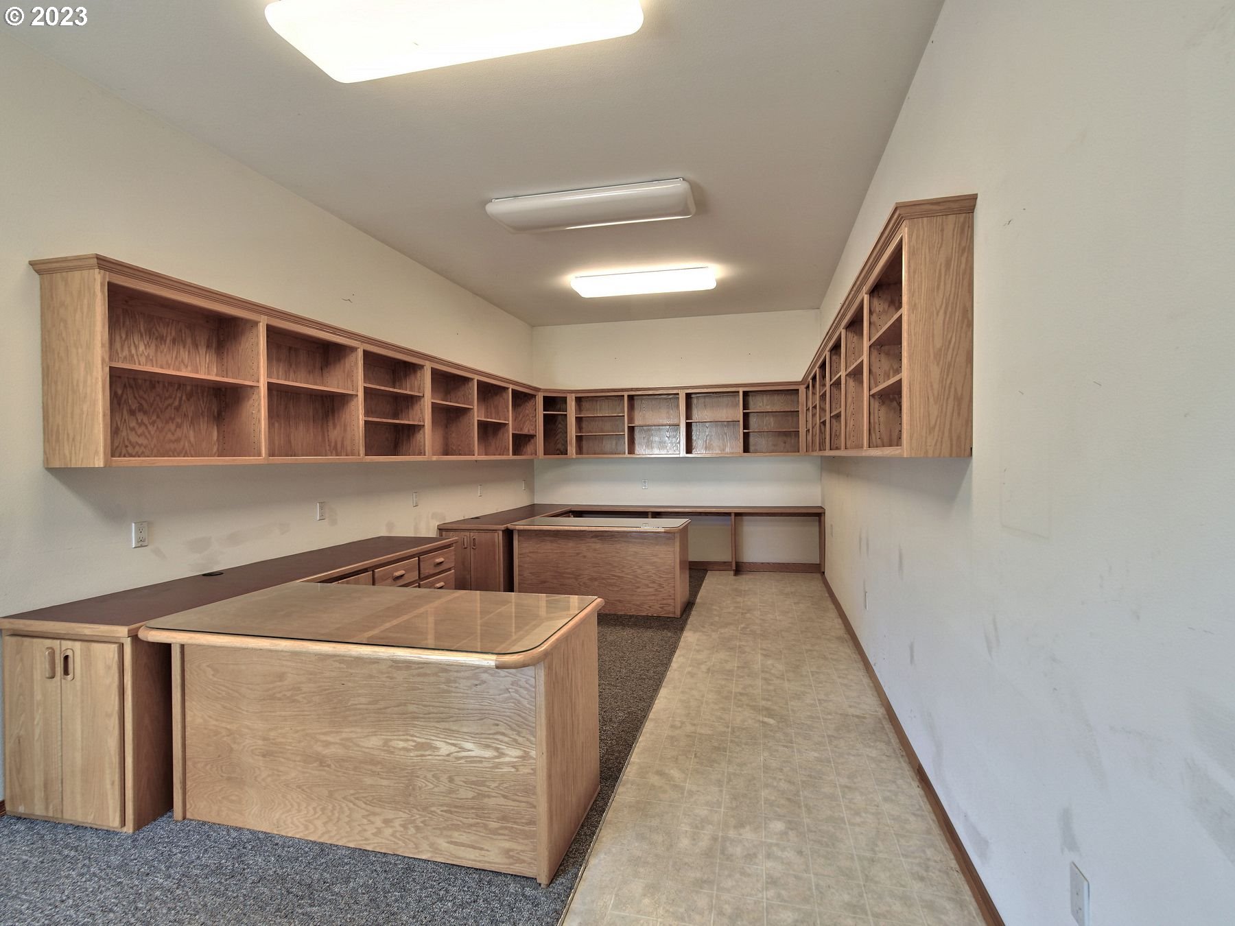 1101 Northeast 264th Street Ridgefield, WA 98642 - Photo 35 of 48 a backyard with wooden cabinets and couch