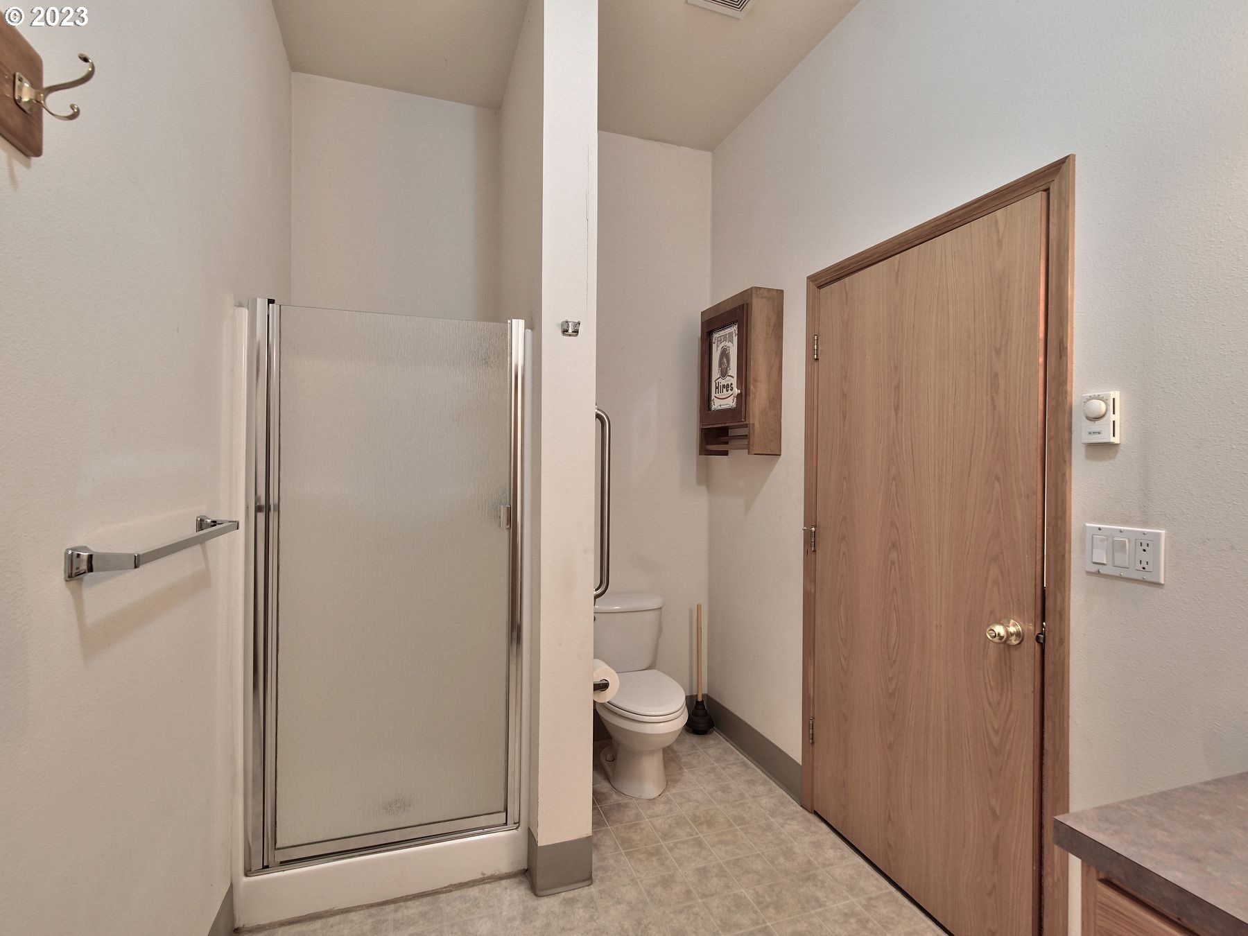 1101 Northeast 264th Street Ridgefield, WA 98642 - Photo 38 of 48 a bathroom with a glass door shower