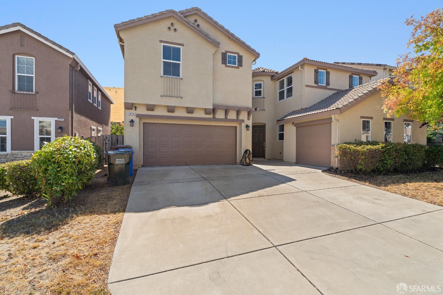 2974 Pilar Ridge Drive Bay Point, CA 94565 - Photo 1 of 1 a front view of a house with a yard