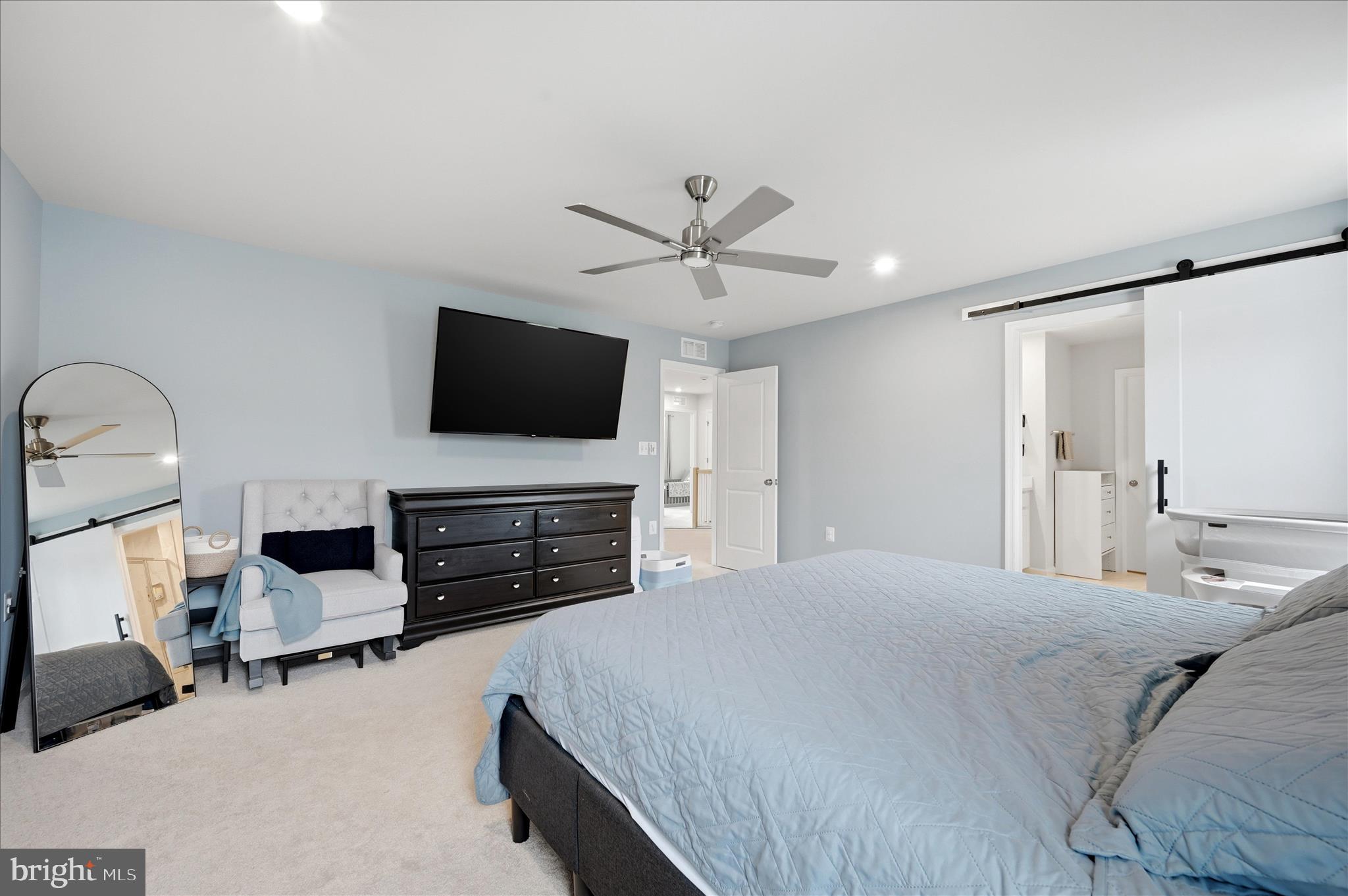152 National Street Ranson, WV 25438 - Photo 28 of 53 a bedroom with a bed and a flat screen tv