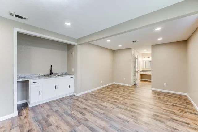 a view of kitchen and sink
