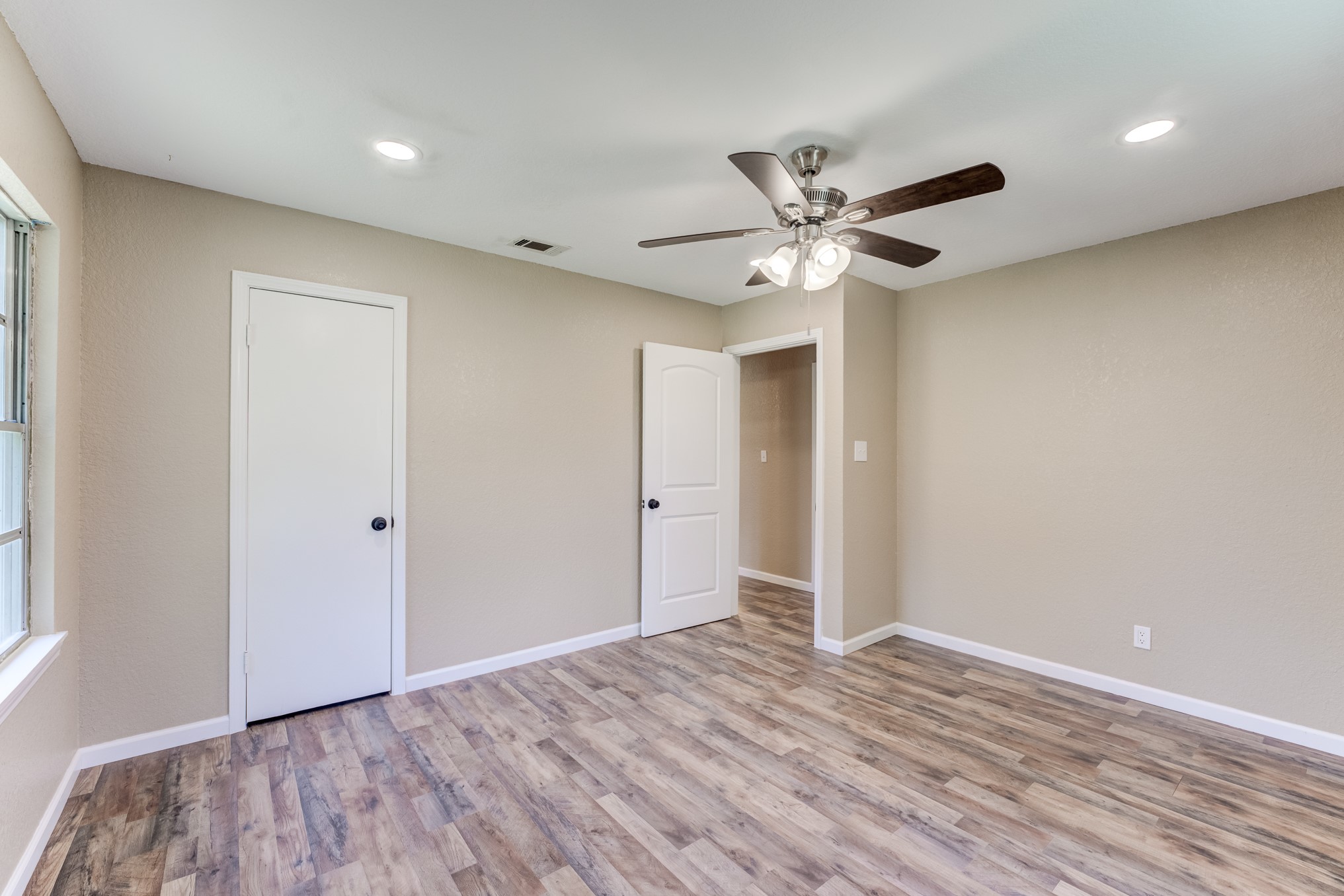 305 Yaupon Street Sweeny, TX 77480 - Photo 32 of 50 a view of an empty room with a window