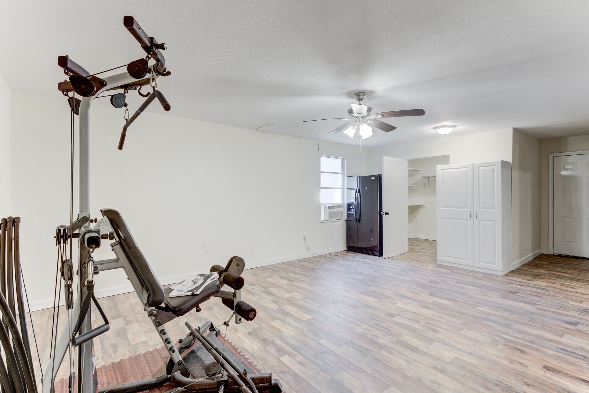 305 Yaupon Street Sweeny, TX 77480 - Photo 37 of 50 a view of a room with gym equipment