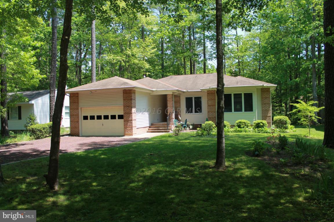49 Moonraker Road Ocean Pines, MD 21811 - Photo 2 of 27 a view of a house with a yard and sitting area