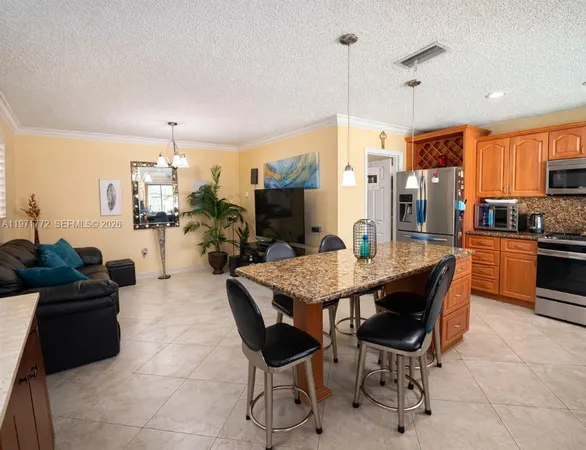 $585,000 | 11827 Northwest 39th Street, Sunrise, FL 33323