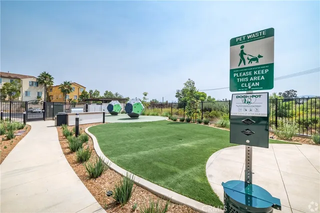 a view of a park with welcome board