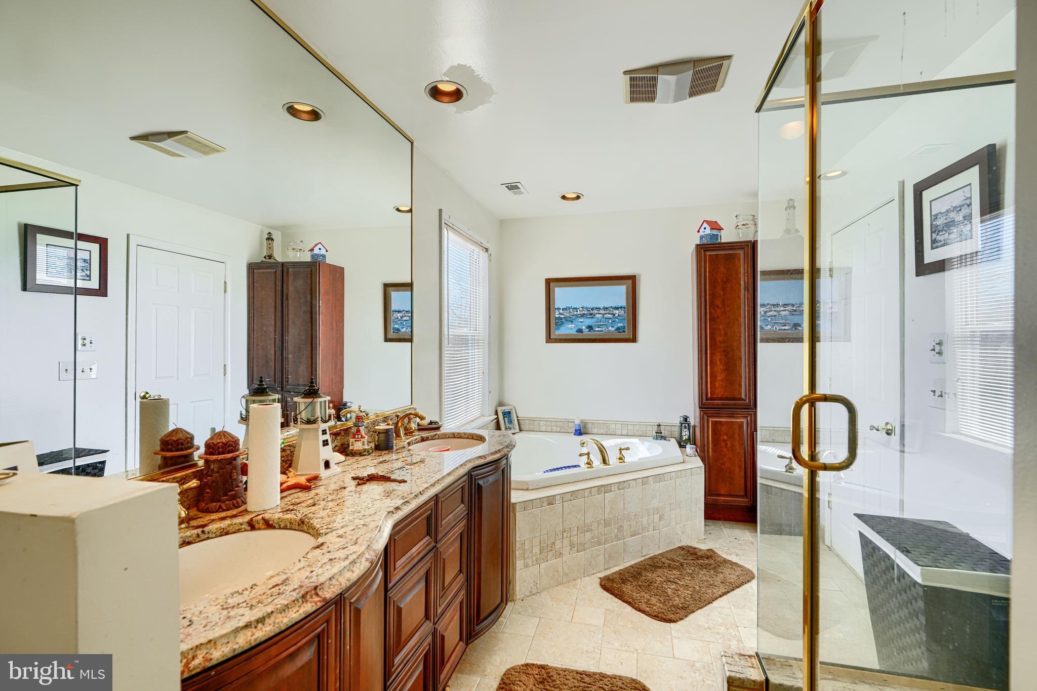 1510 Denton Road Essex, MD 21221 - Photo 22 of 39 a bathroom with a tub sink and mirror