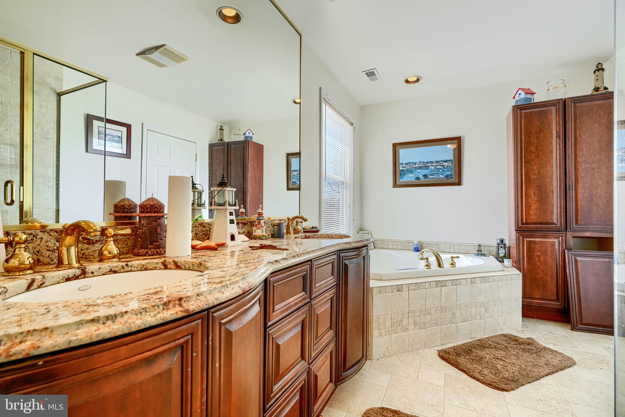 1510 Denton Road Essex, MD 21221 - Photo 23 of 39 a bathroom with a sink double vanity granite and a bathtub