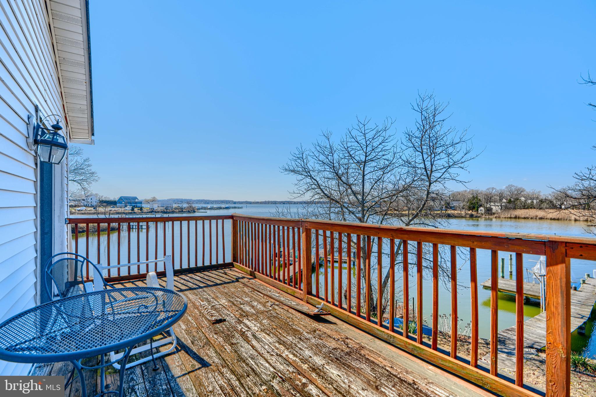 1510 Denton Road Essex, MD 21221 - Photo 27 of 39 a view of balcony with wooden floor and outdoor seating