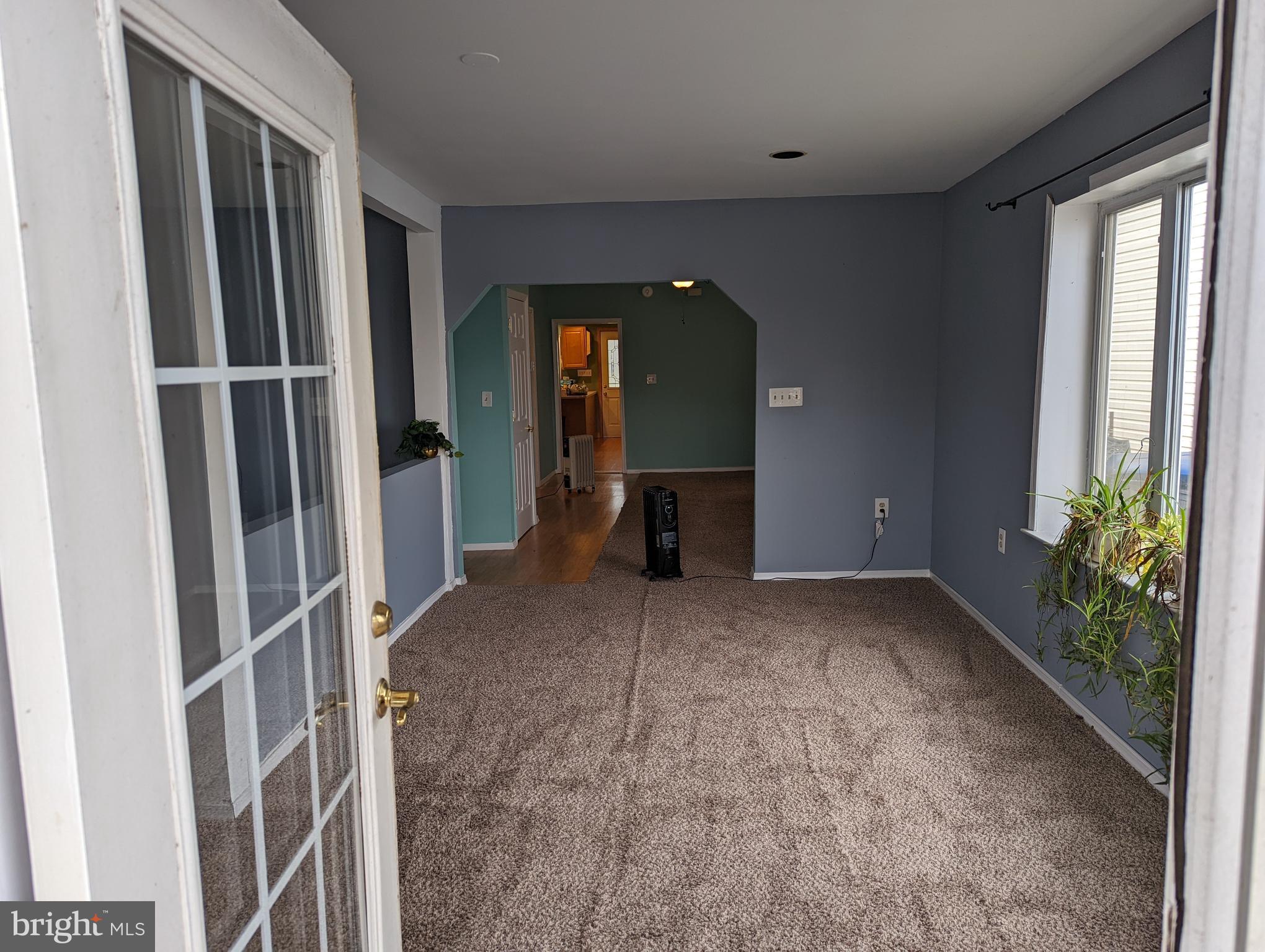 1510 Denton Road Essex, MD 21221 - Photo 9 of 39 a view of a room with a fireplace