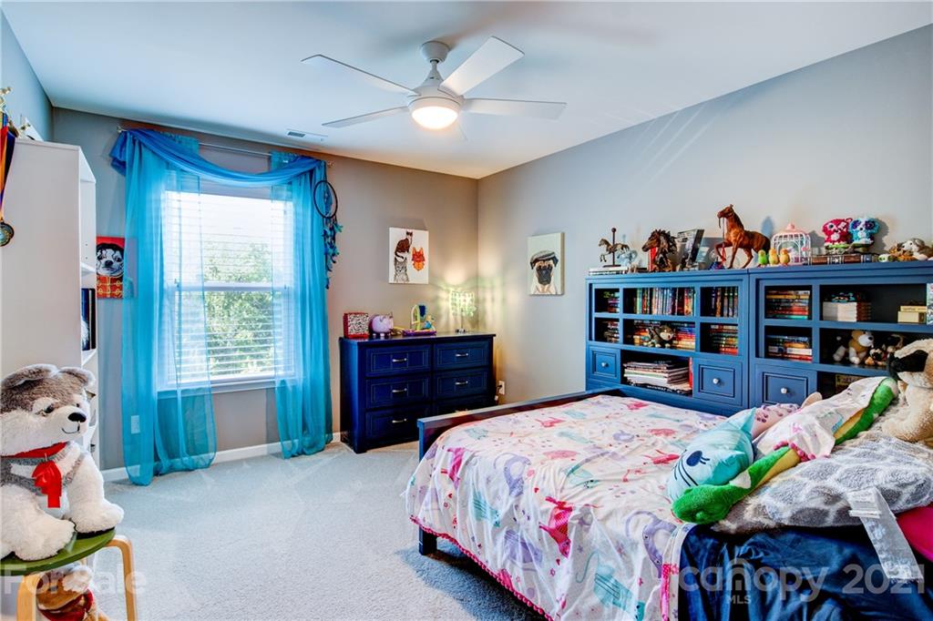 5378 Meadowcroft Way Fort Mill, SC 29708 - Photo 22 of 44 a bedroom with a bed closet and a window