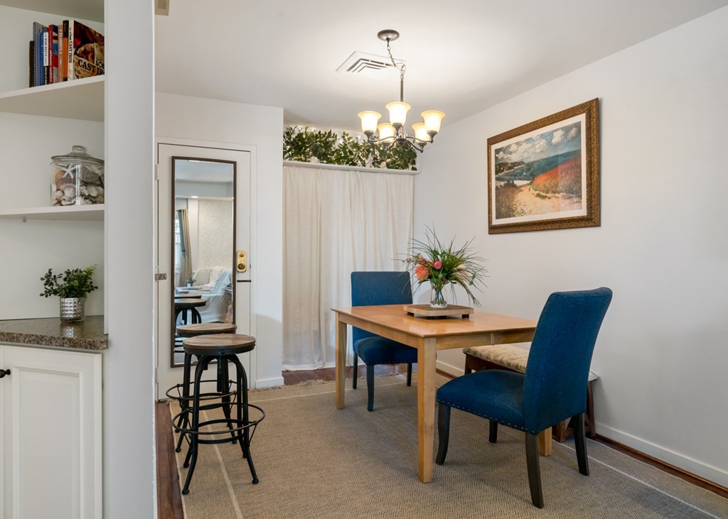 26 School Street, Unit 211 Hull, MA 02045 - Photo 11 of 19 a view of a dining room with furniture