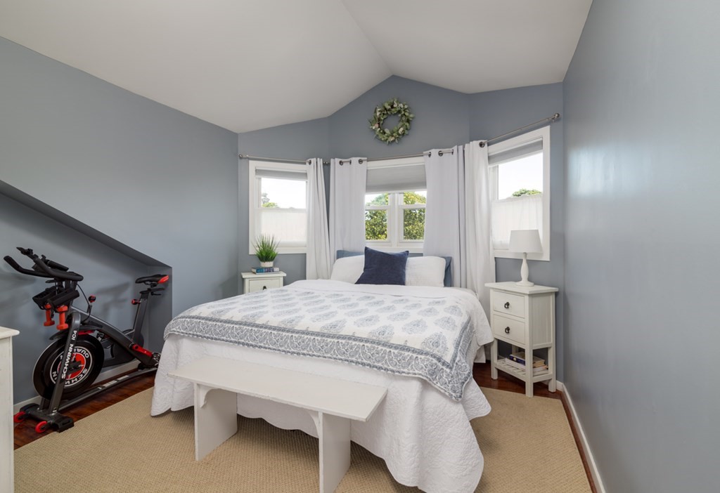 26 School Street, Unit 211 Hull, MA 02045 - Photo 6 of 19 a bed room with a bed and a tv