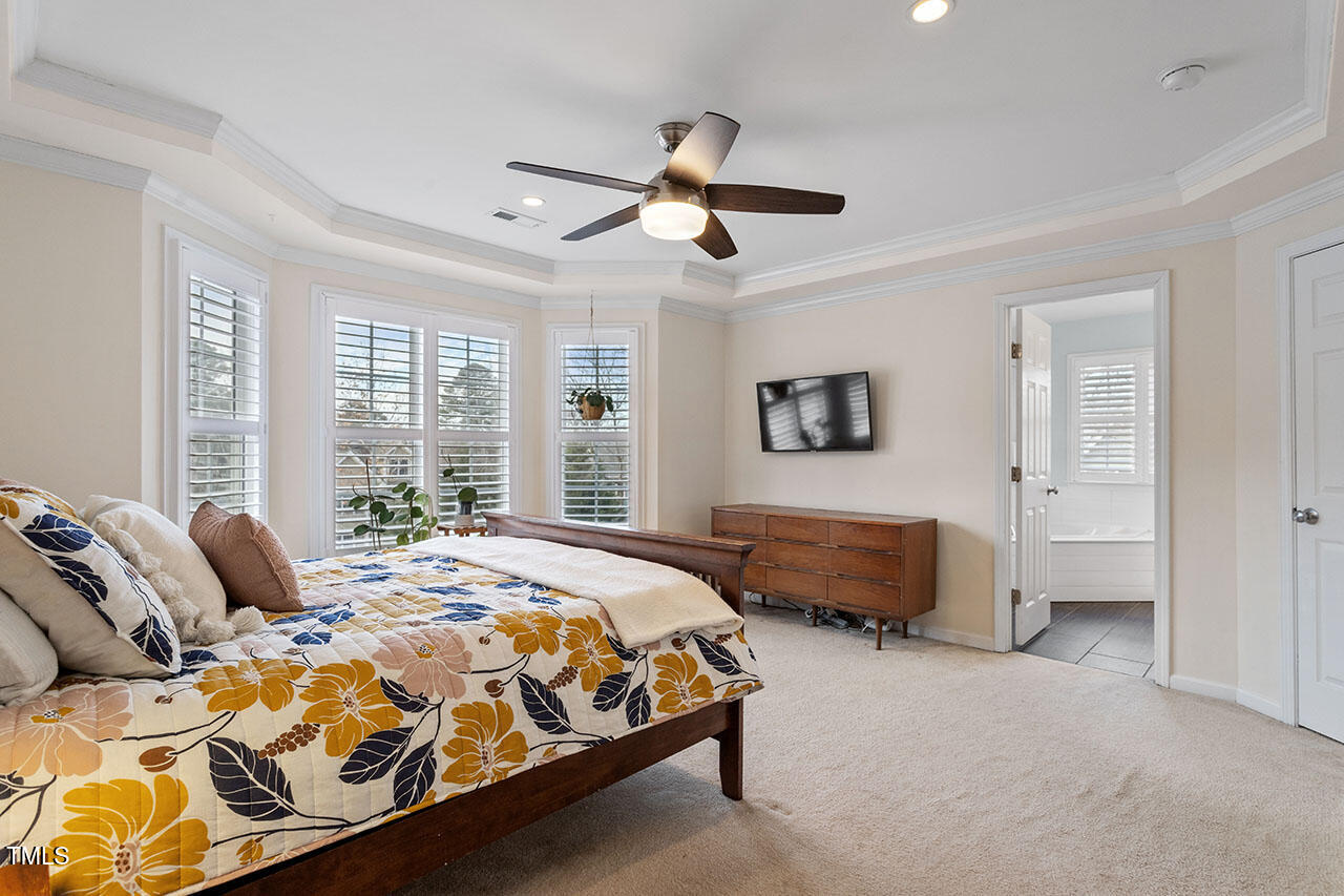 5 Spring Water Lane Durham, NC 27712 - Photo 18 of 32 a bedroom with double bed and a window